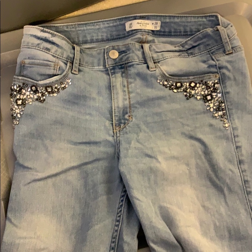 6r A&F jeans with sparkle accent with rips on knee